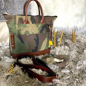 R Riveter carry all canvas tote with leather trim.